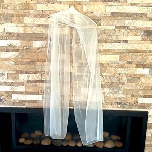 Hand custom made in Canada long over the shoulder sheer shawl.